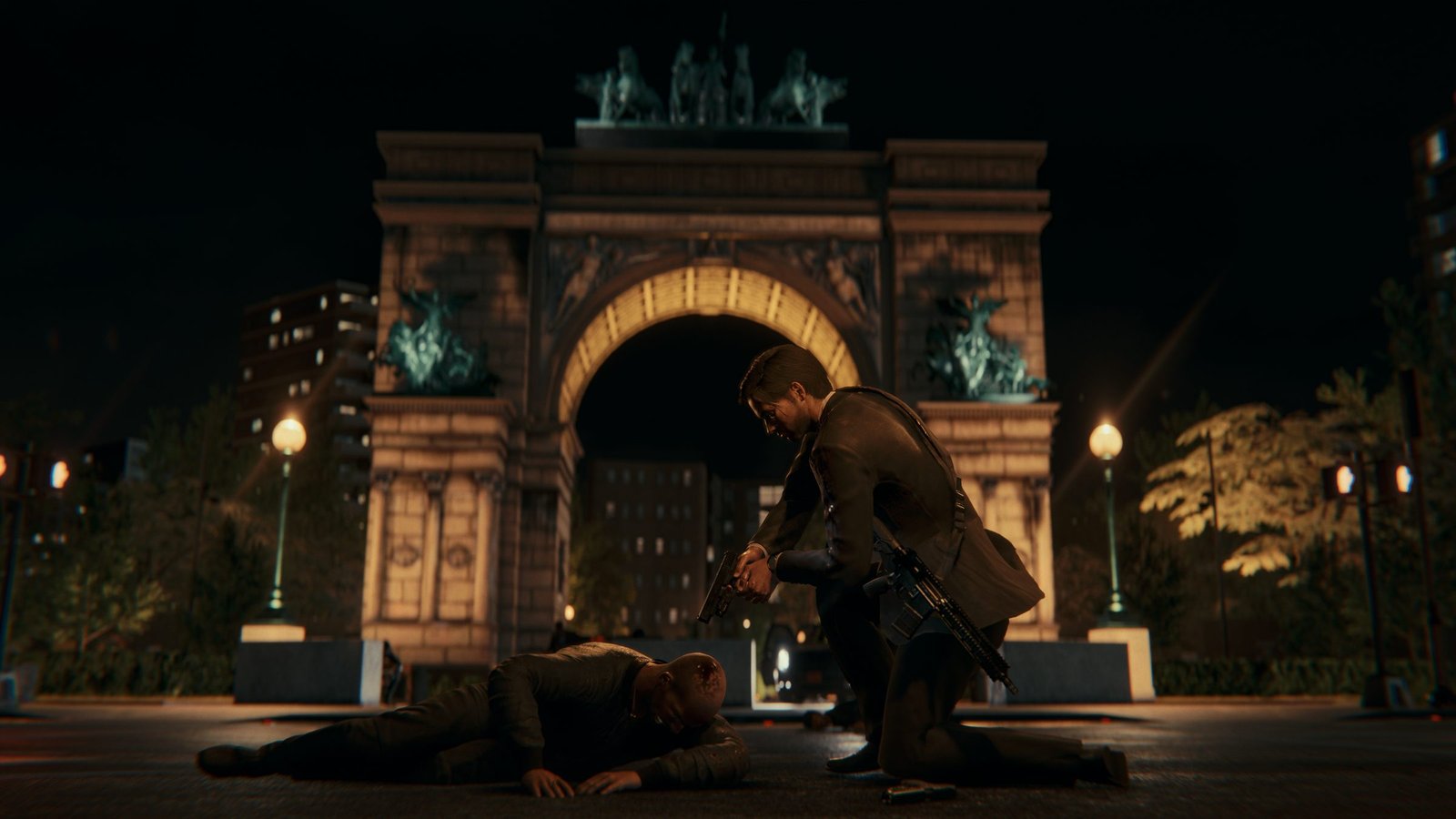 Grand Army Plaza arch at night, Anton kneeling over a body