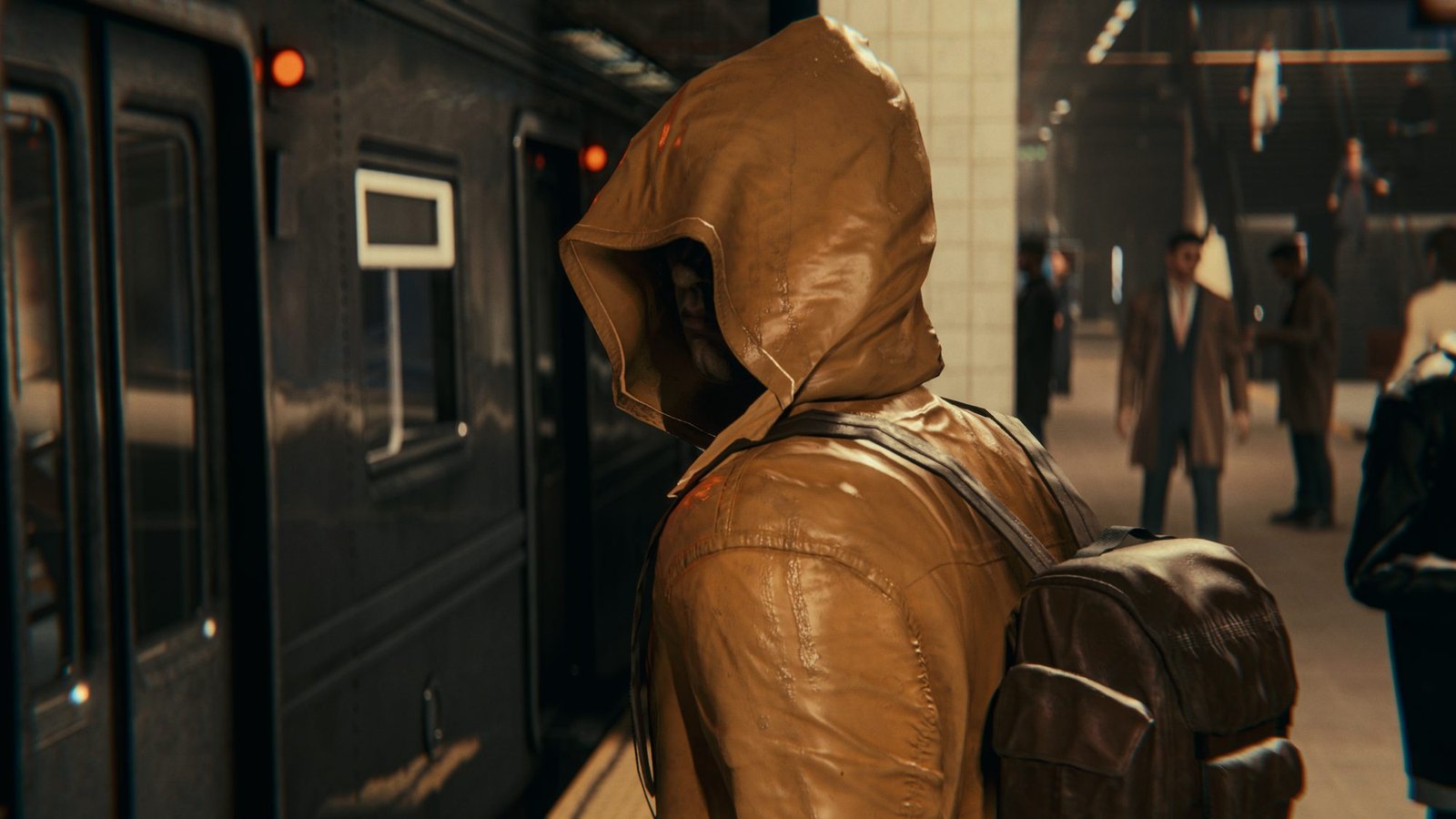 A hooded figure at the subway platform